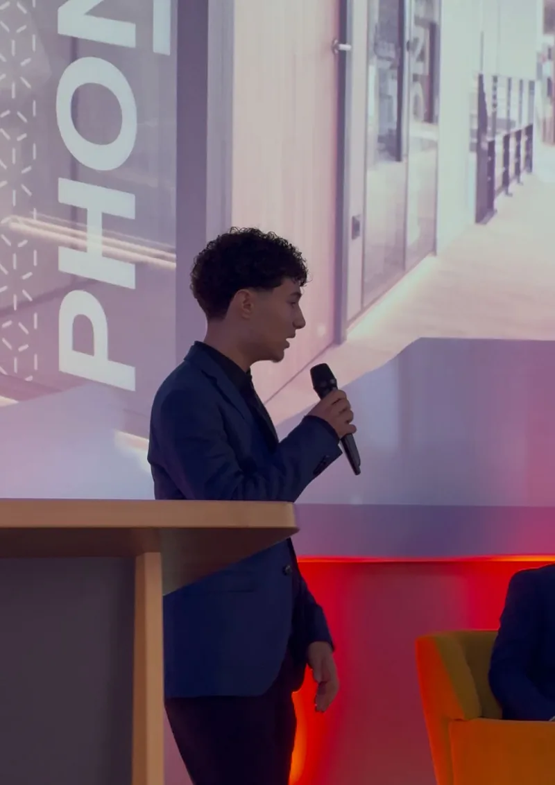 Speaker presenting at an Xelence event